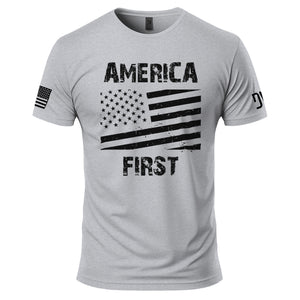 Gray t-shirt with American flag and 'America First' text on a white background