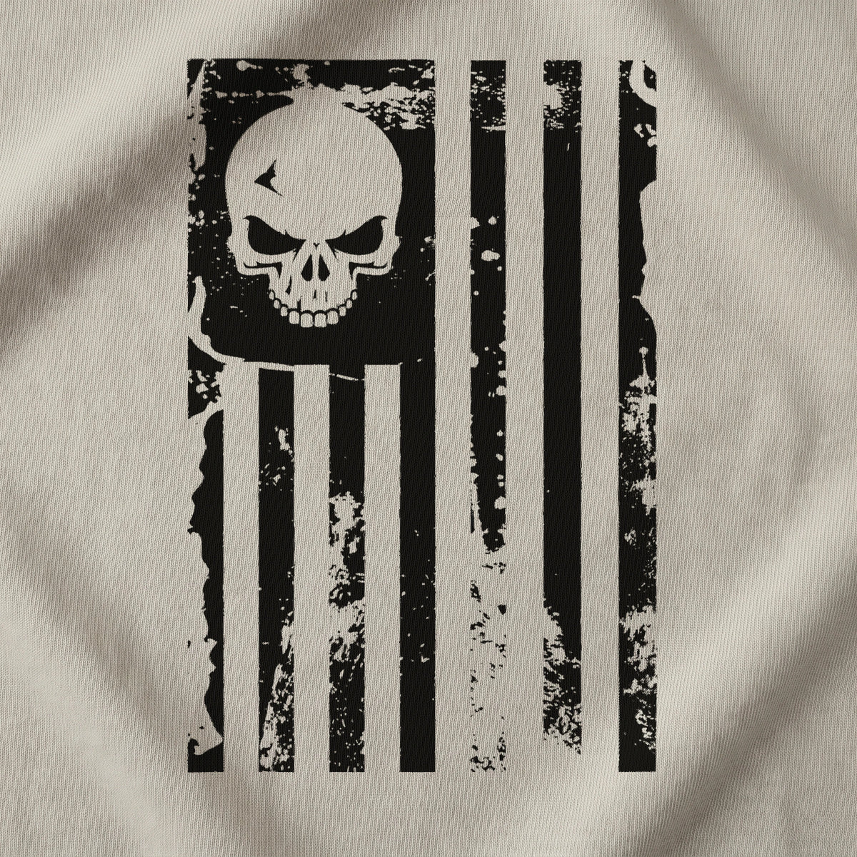 Close-up of the American Flag Skull T-Shirt front print on Sand: the skull in the canton and the distressed black stripes (digitally composited print visualization, not a photograph)