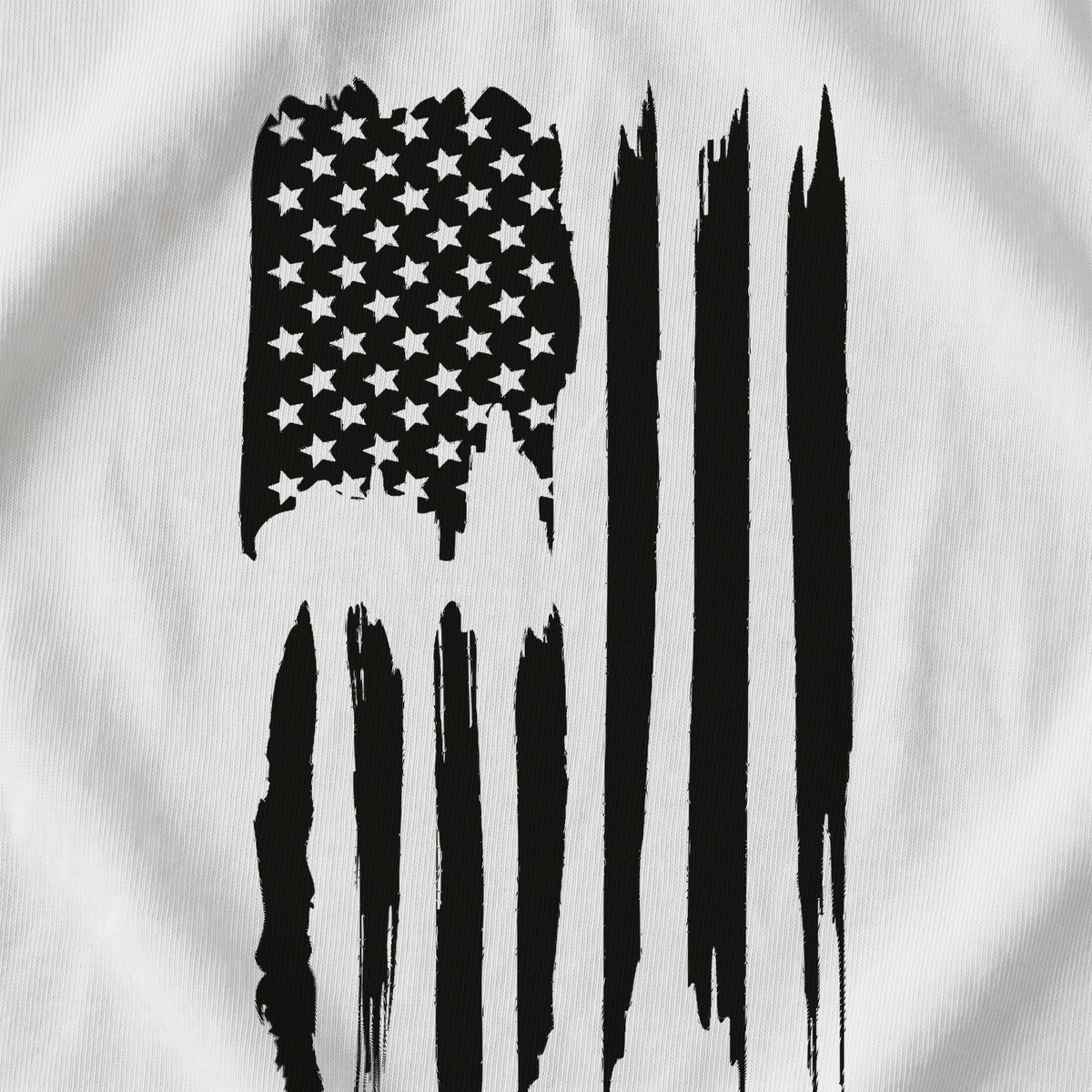 Close-up of the American Flag T-Shirt front print on White: a vertical American flag in black with a weathered brush-stroke finish (digitally composited print visualization, not a photograph)