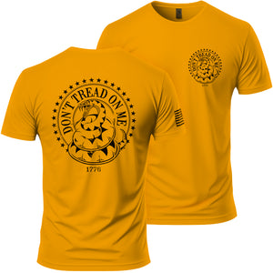 Don't Tread on Me T-Shirt in Gold, back and front: Gadsden rattlesnake seal printed large on the back, small matching seal on the left chest, American flag on the right sleeve