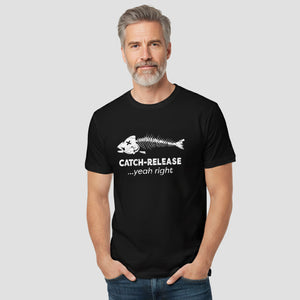 Man wearing a black t-shirt with a fish skeleton design and text on a plain background