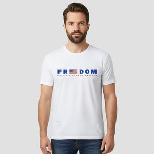 Man wearing a white t-shirt with 'FREEDOM' and an American flag design on a plain background