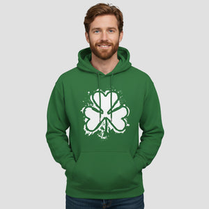 Man wearing a green hoodie with a white shamrock design on a light gray background