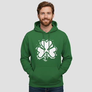 Man wearing a green hoodie with a white shamrock design on a light gray background