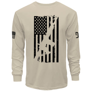 Beige long-sleeve shirt with American flag graphic and small flags on sleeves on a white background