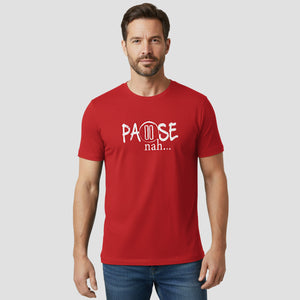 Man wearing a red t-shirt with white text on a plain background