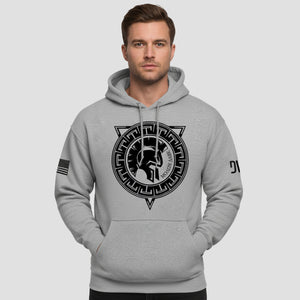 Man wearing a gray hoodie with a black logo on a light gray background