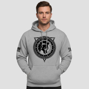 Man wearing a gray hoodie with a black logo on a light gray background