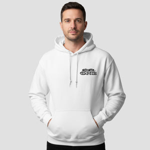 Man wearing a Trust No One hoodie with text on a gray background