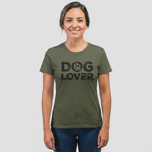 Person wearing a green t-shirt with 'DOG LOVER' text on a plain background