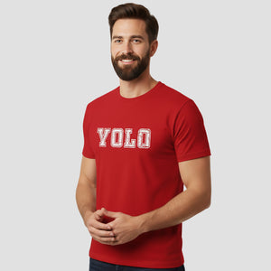 Man wearing a red t-shirt with 'YOLO' text on a plain background